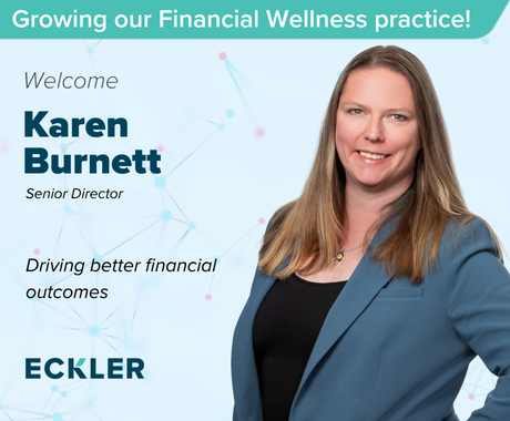 Promotional Eckler graphic announcing the growth of the Financial Wellness practice. A professional headshot of a person wearing a blue blazer appears on the right side against a light blue background with a subtle network pattern. Text on the left reads: “Growing our Financial Wellness practice!”, “Welcome Karen Burnett”, “Senior Director”, and “Supporting your current and emerging needs.” The Eckler logo appears at the bottom left.
